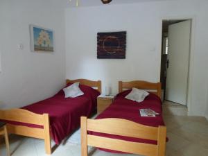 Postel nebo postele na pokoji v ubytování Villa Fede