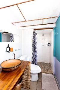 a bathroom with a sink and a toilet at Casa Marimba in La Laguna +168 photos