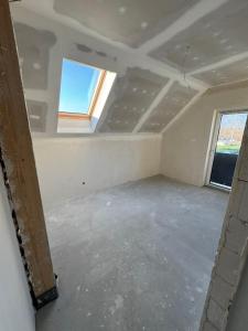 a room with a ceiling and a window at Perła pod Śnieżką in Miłków