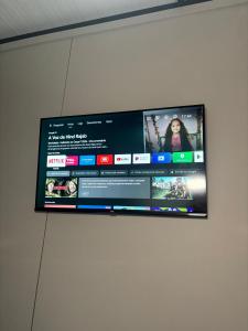 a flat screen tv hanging on a wall at Suite Home Sinop in Sinop