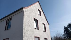 a tall building with windows on the side of it at Werreufer Loft in Detmold
