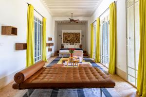 a large couch in a room with a bed at Villa ouidane in Marrakesh +80 photos