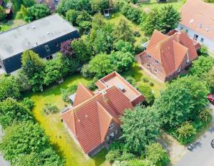 an overhead view of a house with a roof at Friesenpark 8 in Wurster Nordseeküste