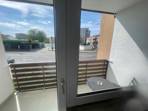 a window with a view of a parking lot at Wohnen Nähe Salzgittersee in Salzgitter