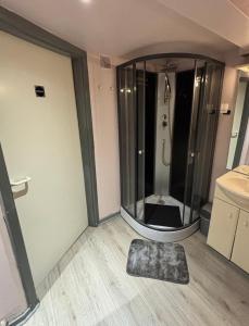 a bathroom with a shower with a mirror in it at Domaine Heyen in Waimes +27 photos