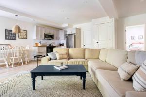 a living room with a couch and a table at Cozy Country Guest Suite in Zionsville