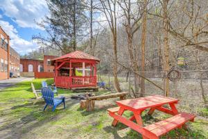 a gazebo and picnic tables in a yard at Direct Warrior Trail Access! Ultimate ATV Getaway in Gary