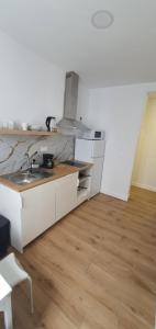 a kitchen with a sink and a counter at HDEZfalcon in Las Lagunas +20 photos