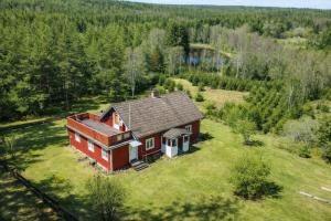 an aerial view of a house in a field at Hus Idås in Fågelfors