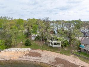 an aerial view of a large house with a yard at Vacation Home Mallard Water Front two king beds in Lake Ozark