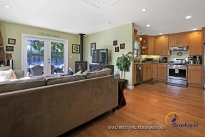a large living room with a couch and a kitchen at Beach Lovers Retreat in Santa Cruz +19 photos