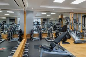a gym with treadmills and elliptical machines at Delta Hotels by Marriott Durham Royal County in Durham