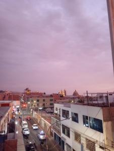 a view of a city with cars on a street at Mihostal Bless in Tacna