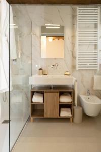a bathroom with a sink and a mirror at Casa Gabri Boutique B&B Tuscan Villa retreat in Massa +31 photos