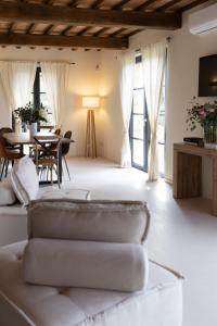 a living room with a couch and a table at Casa Gabri Boutique B&B Tuscan Villa retreat in Massa