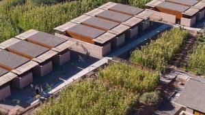 an overhead view of a building in a field at Fauna Atacama in San Pedro de Atacama