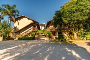 a house with a street in front of it at Pousada Drehmer Haus in Gramado +80 photos
