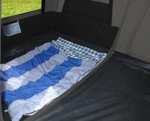 a bed in the back of a truck at Surf Sky Tamraght in Tamraght Ouzdar