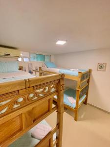 a bedroom with two bunk beds in a room at IvoMar Karey 102 in Rodadero