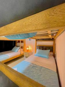 two bunk beds in a room with at IvoMar Karey 102 in Rodadero +44 photos