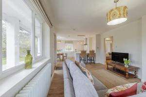 a living room with a couch and a table at 2 Bed in Llangasty oc-d39006 in Llangorse