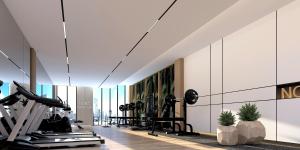 a gym with cardio equipment in a building at Hampton By Hilton Jeddah Souq7 in Jeddah