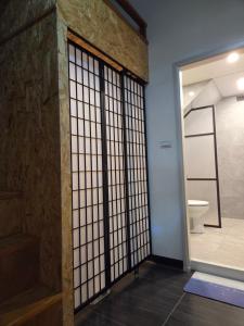 a room with a toilet and a glass door at 珊禾 民宿編號2150號 in Taimali +23 photos
