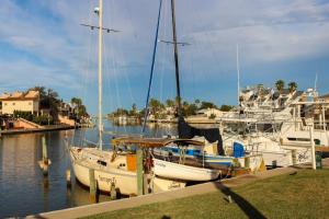 a group of boats docked in a marina at Leeward Cove A8 in Corpus Christi