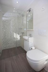 Kylpyhuone majoituspaikassa Apartments Dalmata