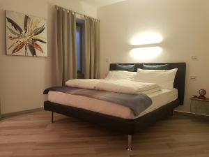 Postel nebo postele na pokoji v ubytování B&B Perbacco Relax