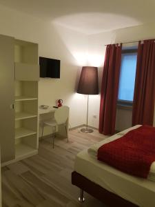 TV a/nebo společenská místnost v ubytování B&B Perbacco Relax