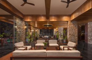 a living room with a couch and chairs at The Rockwall Boutique Hotel Bentota in Bentota