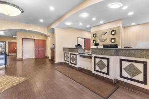 a lobby of a hospital with a reception desk at Comfort Inn Ogden near Event Center in Ogden