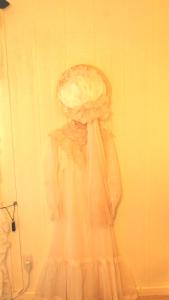 a person in a white dress in a bathroom at Tombstone Bordello Bed & Breakfast in Tombstone +68 photos