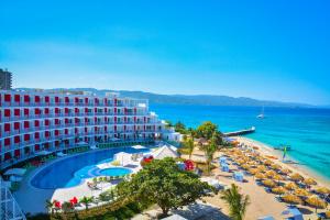 an aerial view of a hotel and the ocean at Grand Decameron Cornwall Beach, A Trademark All-Inclusive Resort in Montego Bay