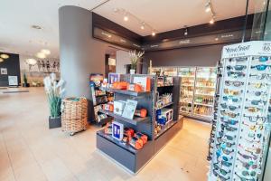 a store aisle with products on display in a store at aja Grömitz in Grömitz