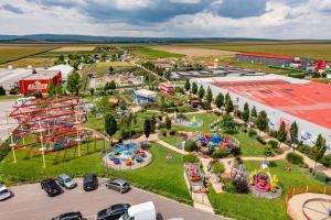 an aerial view of an amusement park with a roller coaster at Merlin's Camp in Znojmo