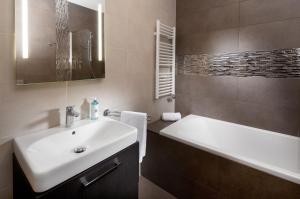 Koupelna v ubytování Mamaison Residence Sulekova Bratislava