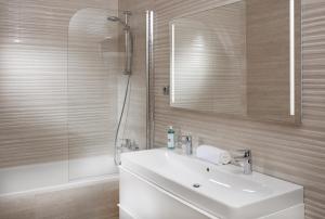 Koupelna v ubytování Mamaison Residence Sulekova Bratislava