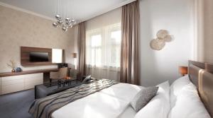 Postel nebo postele na pokoji v ubytování Mamaison Residence Sulekova Bratislava