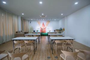 a group of tables and chairs in a room at Terra Sky Home in Pak Chong +77 photos