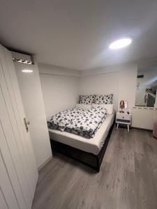 a bedroom with a bed in a room at ZK Zimmer in Stuttgart +9 photos