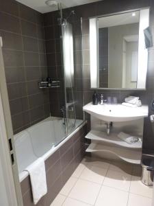 Ванная комната в Aparthotel Adagio Aix-en-Provence Centre
