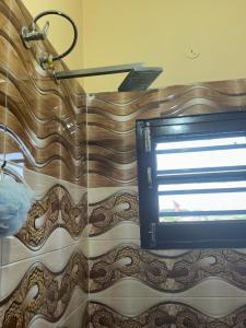 a computer monitor on a table with a snake on it at Army cuisine Dine in and LUXURY NIGHTLY STAY Kurali Punjab in Kūrāli +61 photos