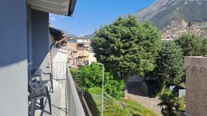 a balcony with a view of a city at Trilogy b&b in Celano