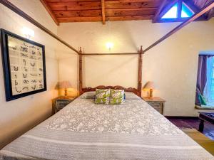 a bedroom with a large bed in a room at Wild Meadows by Levitate - Exclusive Dual Bedroom Chalet Open Sky View & Fully Equipped Kitchen in Rāmgarh