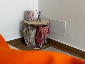 a small table in a corner of a room at El Rincón del Castillo I in Caravaca de la Cruz +9 photos