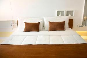 Esplendor by Wyndham Asuncion tesisinde bir odada yatak veya yataklar