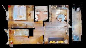 an overhead view of a living room with furniture at Chesa Chatrigna App 9 - Celerina in Celerina