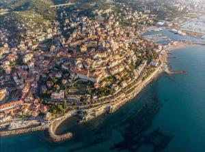 an aerial view of a city next to the water at La casa di Marco in Imperia